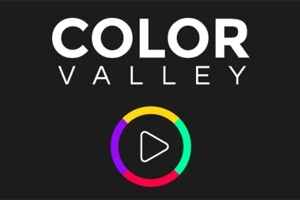 Teksti COLOR VALLEY ja värikäs ympyrä, jossa on kolmionmuotoinen toistopainike keskellä mustaa taustaa