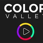 Teksti COLOR VALLEY ja värikäs ympyrä, jossa on kolmionmuotoinen toistopainike keskellä mustaa taustaa