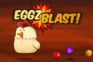 Kana kirjavaa taustaa vasten vasemmalla ja värikkäitä palloja oikealla; tekstinä EGGZ BLAST!