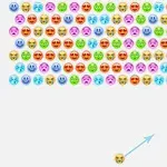 Ryhmä värikkäitä emojipalloja rivissä, alapuolella yksi vapaa pallo ja nuoli, joka osoittaa ylöspäin