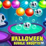 Värikkäitä kuplia ja pääkalloja leijuu kirkkaanväristen kattiloiden yläpuolella, ja kuvassa on teksti Halloween Bubble Shooter
