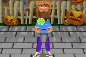 Lapsi kerää karkkeja kadulla päällään sininen t-paita, ja taustalla näkyy Halloween-kurpitsoja ja aita