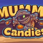 Muumiokarkkeja logo, jossa on piirretty muumio ja värikkäitä karkkeja