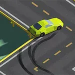 Keltainen auto tekee renkaanjälkiä harmaalle tielle kaarteessa kaiteen lähellä