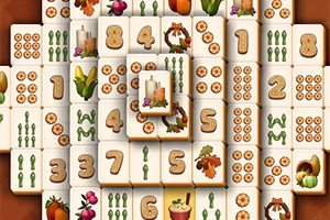 Mahjong-laattoja, joissa on numeroita ja syksyaiheisia kuvia kuten kynttilöitä, vihanneksia ja lehtiä